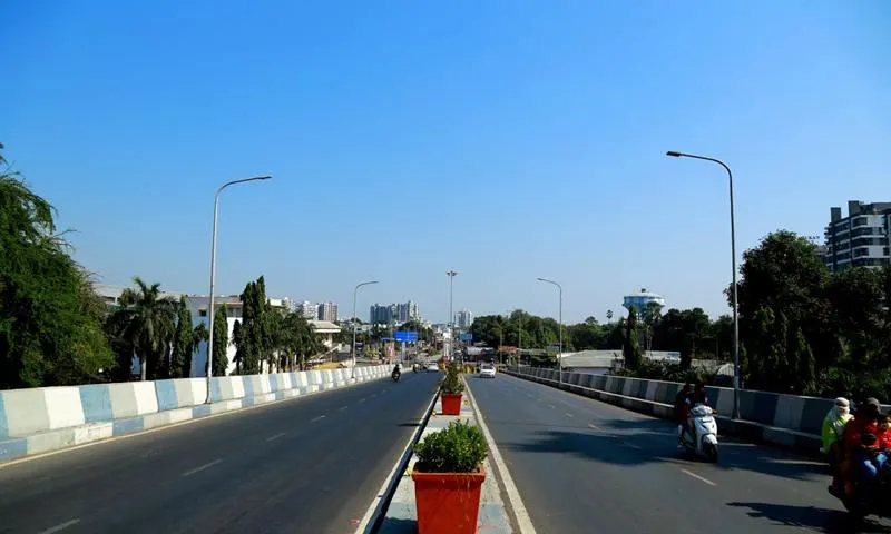 Packers and movers in Surat — city skyline along the Tapi